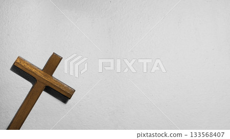 Christian cross on a white background. Concept of Christianity, religious, faith, Jesus, or belief Christian cross on a white background. Concept of Christianity, religious, faith, Jesus, or belief 133568407