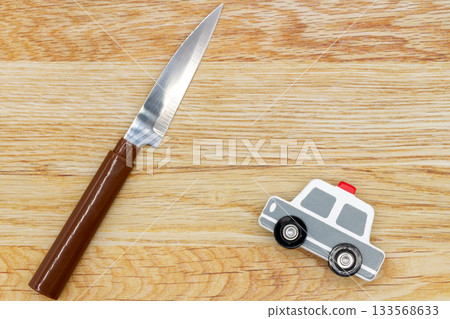 Image of knives and police cars (danger/crime) Image of knives and police cars (danger/crime) 133568633