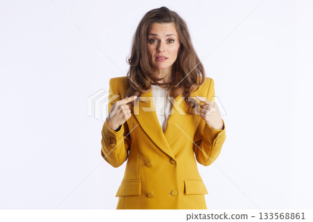 Questioning Businesswoman Pointing to Herself Questioning Businesswoman Pointing to Herself 133568861