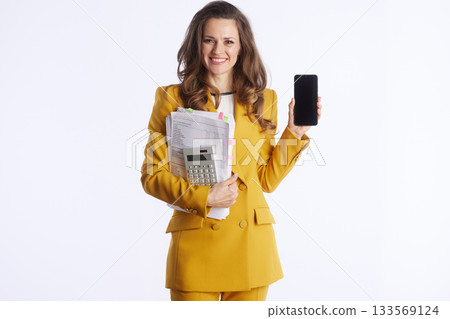 Tech-Savvy Businesswoman with Documents and Smartphone 133569124