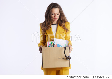 Professional Woman Reflecting on Job Loss Professional Woman Reflecting on Job Loss 133569127