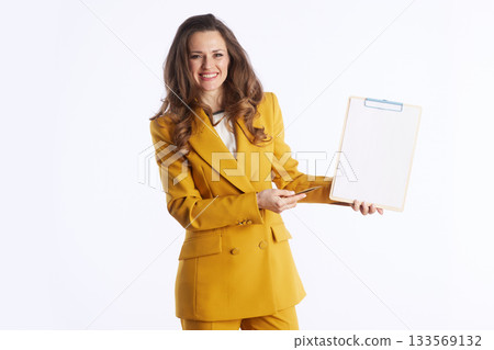 Businesswoman Presenting with Clipboard 133569132