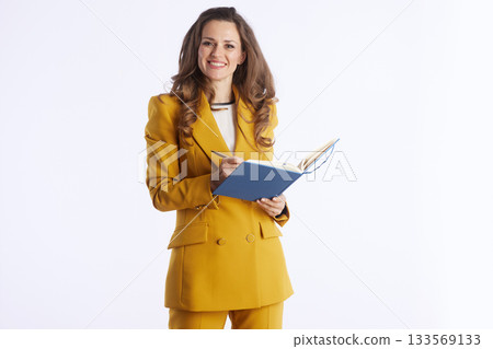 Confident Businesswoman Taking Notes with Pen 133569133