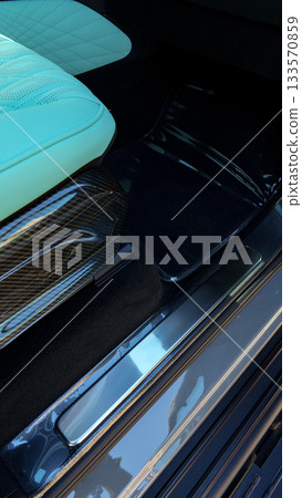 Luxury car interior featuring detailed seat design and sleek materials 133570859