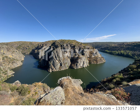 Majestic River Canyon Under Clear Blue Sky 133571057