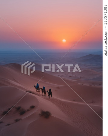 Three travelers on dromedaries cross rippling sand dunes at sunset, a small caravan moving through the vast, arid desert under a warm, golden horizon at dusk 133571395