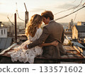 A couple sits on a rooftop hugging each other, looking at the breathtaking view of the city. 133571602