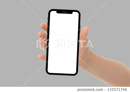 A hand holds a horizontally oriented blank smartphone 133571746