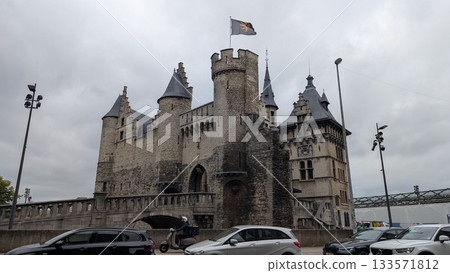 Old castle with a flag in Antwerp 133571812