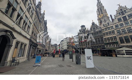 Toilet signs at the touristic area with European buildings and cathedral in Antwerp 133571814