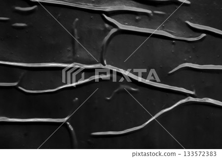 black crumpled and creased plastic poster texture background black crumpled and creased plastic poster texture background 133572383