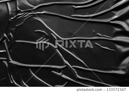 black crumpled and creased plastic poster texture background black crumpled and creased plastic poster texture background 133572387
