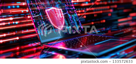 Laptop with glowing cybersecurity shield hologram and digital protection interface 133572633
