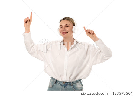 Woman dances joyfully while wearing headphones, isolated on white, PNG Woman dances joyfully while wearing headphones, isolated on white, PNG 133573504