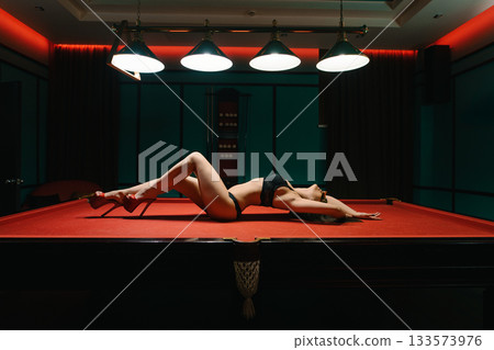 Woman enjoying relaxation at a serene spa sauna retreat in the evening Woman enjoying relaxation at a serene spa sauna retreat in the evening 133573976