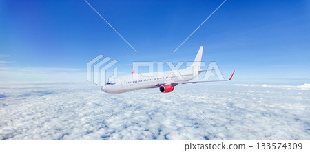White passenger airplane flying in the sky White passenger airplane flying in the sky 133574309