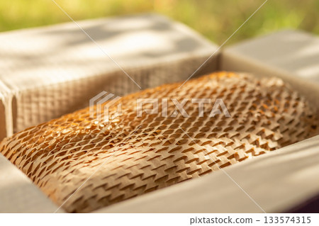 Eco friendly brown paper honeycomb wrap for product packaging parcel carton box Eco friendly brown paper honeycomb wrap for product packaging parcel carton box 133574315