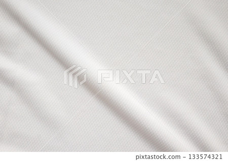 White sports clothing fabric football shirt jersey texture background White sports clothing fabric football shirt jersey texture background 133574321