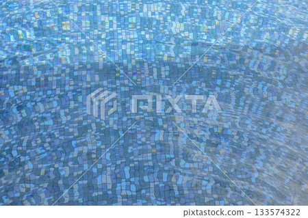 Swimming pool water surface and ripple wave with blue mosaic tiles 133574322