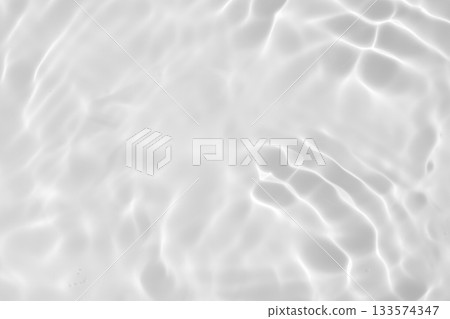 Abstract white transparent water shadow surface texture natural ripple background 133574347