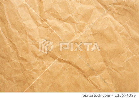 Abstract crumpled and creased recycle brown paper texture background 133574359