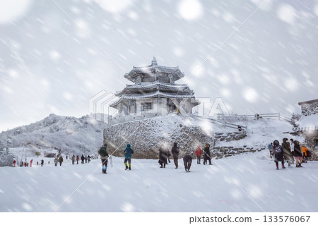 Korean Winter On a snowy day atop Deogyusan Mountain at Deogyusan National Park near Muju, South Korea. 133576067