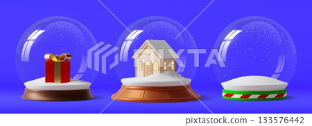 3D glass snow balls with gift box, snowy hills and house. Christmas and New Year glossy snowball globe holiday decoration with glass domes. Vector Christmas glass globe balls with snow and snowflakes 3D glass snow balls with gift box, snowy hills and house. Christmas and New Year glossy snowball globe holiday decoration with glass domes. Vector Christmas glass globe balls with snow and snowflakes 133576442
