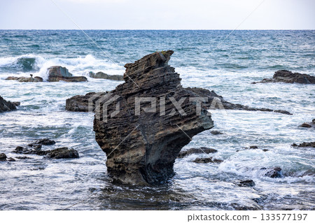 Kabuto Rock, a famous oddly shaped rock formation on Senjojiki Coast in Aomori Prefecture Kabuto Rock, a famous oddly shaped rock formation on Senjojiki Coast in Aomori Prefecture 133577197