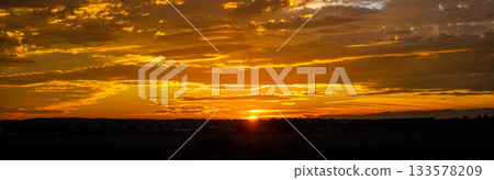 Beautiful sunset cloudscape in the evening. Natural background photography. 133578209