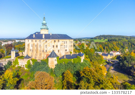 Chateau and Castle Frydlant on sunny autumn day. Frydlant v Cechach, Czech Republic. Aerial view from drone. 133578217