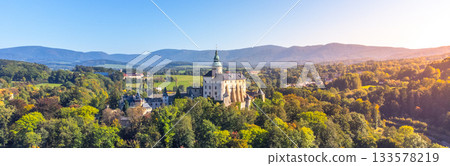 Chateau and Castle Frydlant on sunny autumn day. Frydlant v Cechach, Czech Republic. Aerial view from drone. 133578219