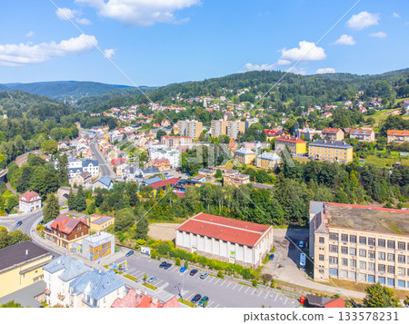 Tanvald on sunny day. Jizera Mountains, Northern Bohemia, Czech Republic. Aerial view from drone. 133578231