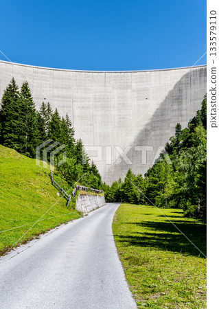 Huge concrete apline dam on sunny summer day. Zillergrundl Speicher, Zillertal Alps, Austria 133579110