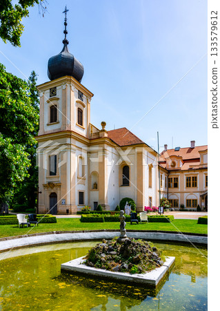 Loucen Castle - baroque chateau with Church of Virgin Mary Assumption and beautiful landscaped park, Czech Republic Loucen Castle - baroque chateau with Church of Virgin Mary Assumption and beautiful landscaped park, Czech Republic 133579612