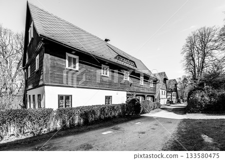 Traditional half-timbered house in rural village of Lusatian Mountains, Czech Republic 133580475
