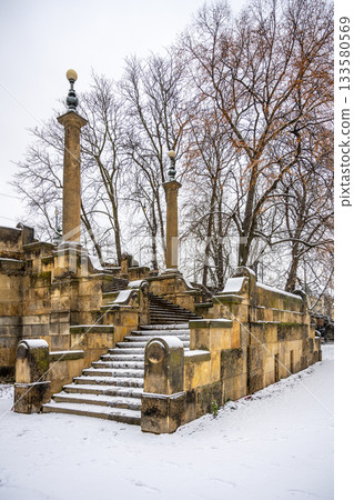 Historical staircase of Legion Bridge on Strelecky Island in Prague, Czech Republic. Winter photography. 133580569