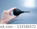 Black Rubber Enema Bulb on gray Background 133580572
