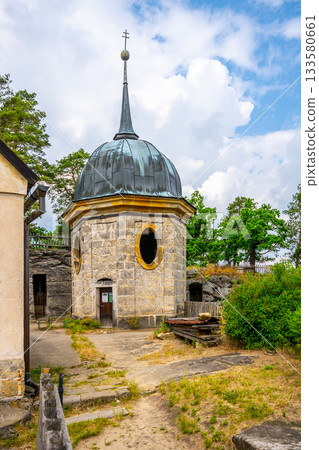 Explore the remnants of Sloup v Cechach castle in Czechia, showcasing its distinctive architecture and surrounded by nature. A serene glimpse into history awaits visitors. 133580661