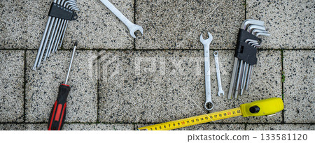 Greeting card of Fathers day. Flat set tools on stone pavement background 133581120