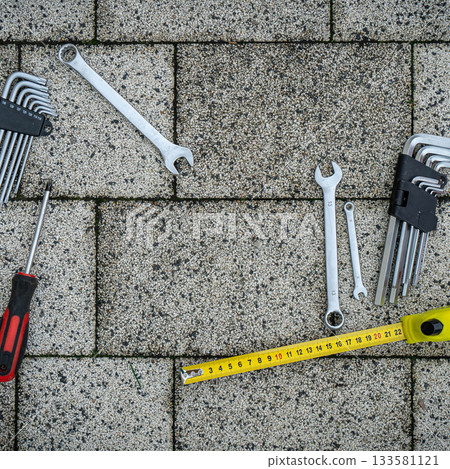 Greeting card of Fathers day. Flat set tools on stone pavement background 133581121
