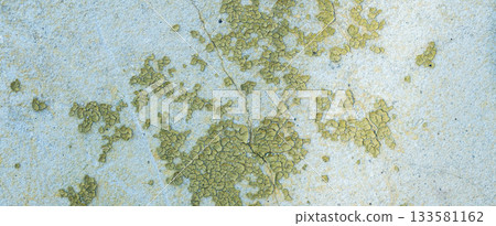Peeling painted concrete wall, cracks of green blue and beige, peeling paint of the old rough concrete wall, peeling paint texture Peeling painted concrete wall, cracks of green blue and beige, peeling paint of the old rough concrete wall, peeling paint texture 133581162