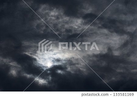 A dramatic dark overcast sky before the storm with thick clouds 133581169