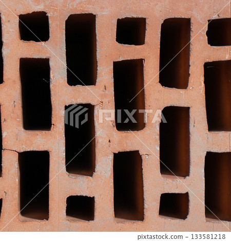 Clay red brick close-uo macro texture. Construction brick isolate on white Clay red brick close-uo macro texture. Construction brick isolate on white 133581218