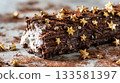 Macro photo of buche de noel adorned with textured chocolate bark, tiny edible gold stars, and cocoa powder, perfect for holiday dessert inspiration 133581397
