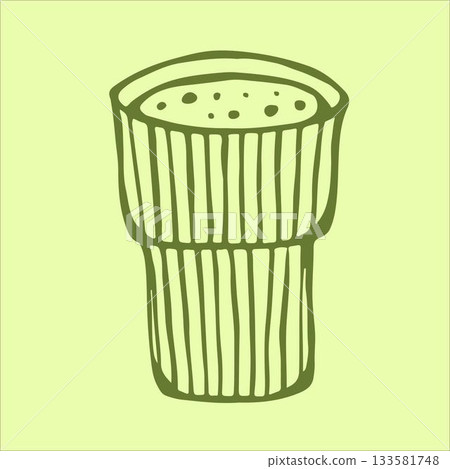 Charming doodle-style faceted glass filled with vibrant matcha green tea, resting on a serene light green background. 133581748