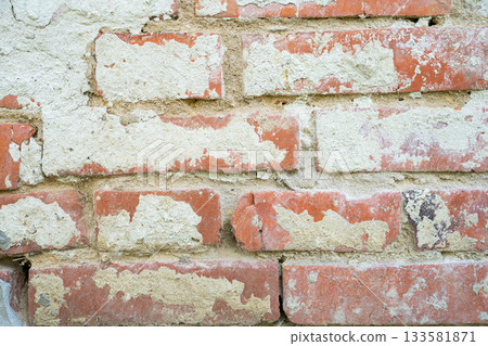 Clay red brick close-uo macro texture. Construction brick isolate on white Clay red brick close-uo macro texture. Construction brick isolate on white 133581871