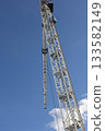Construction Crane Against Blue Sky 133582149