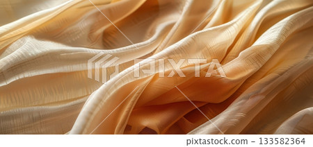 Close-up of beige textured fabric in soft light 133582364