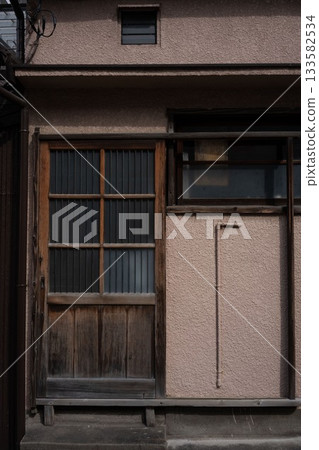 Old sliding door of Japanese house, wooden door of Showa era house 133582534