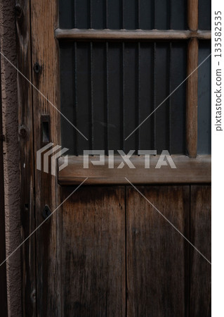 Old sliding door of Japanese house, wooden door of Showa era house 133582535